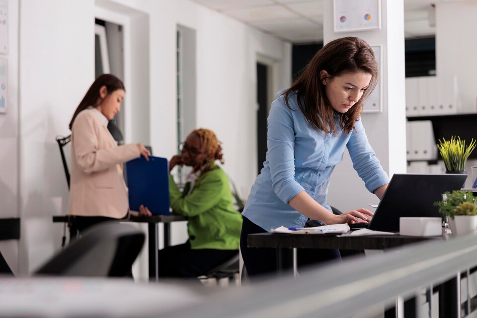 Workplacement trainee receiving hands-on training from a mentor