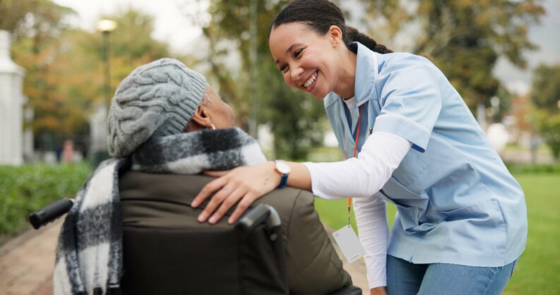 Support worker engaging with a person with a disability.