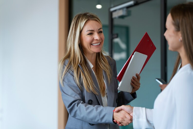 A student celebrating their successful job placement.