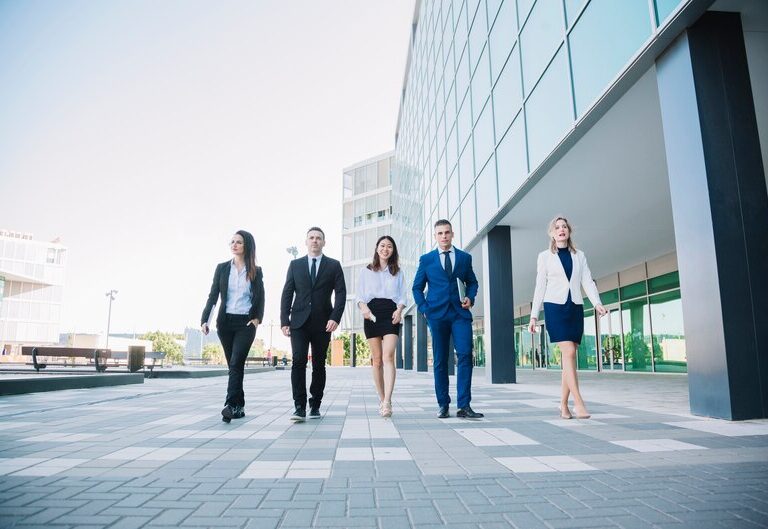 A young professional stepping forward on a bridge, symbolizing career growth and opportunities with Future Finds.