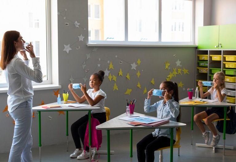 A diverse group of young children and teachers in an early childhood education classroom