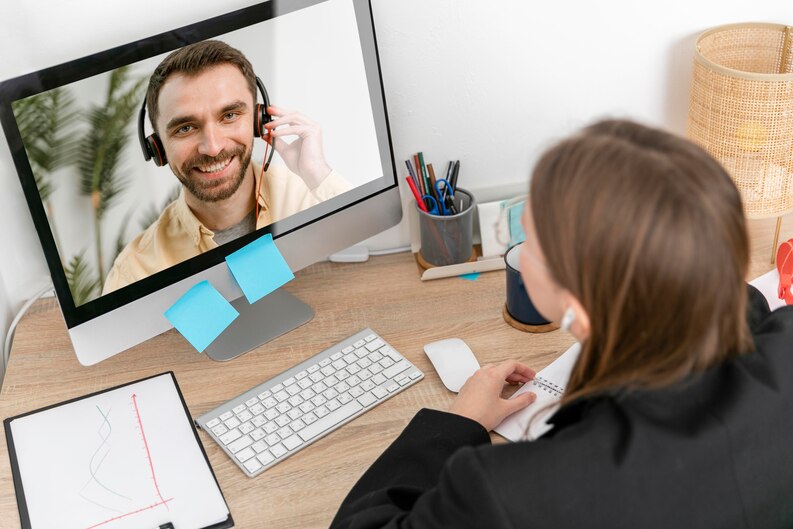 Mentor providing guidance to a mentee online.