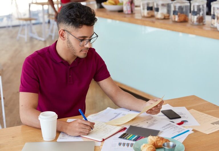 A student performing a hands-on task in a professional setting