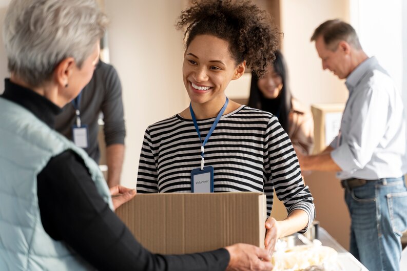A community services worker providing support to individuals in need.