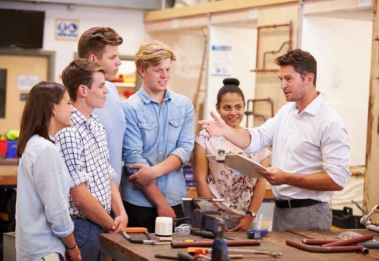 A student learning hands-on at a workplace through a tailored industry placement