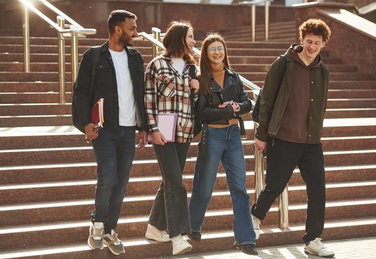 Group of confident Future Finds students standing together outdoors