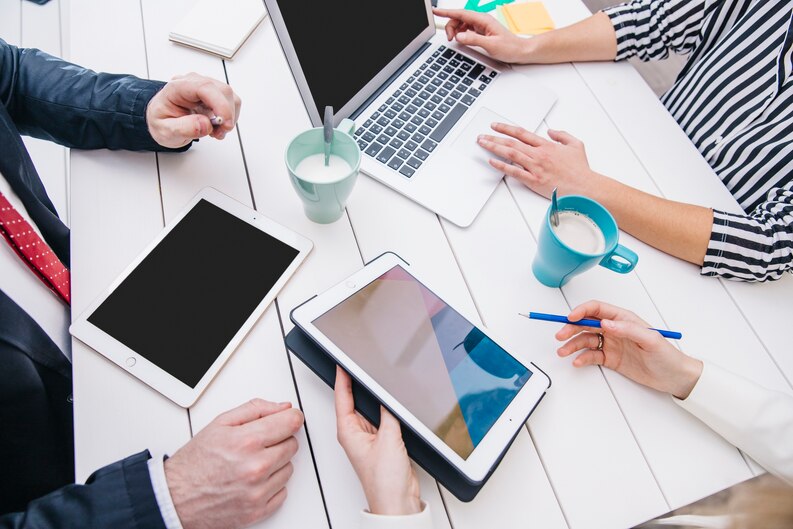 Industry professionals using digital tools