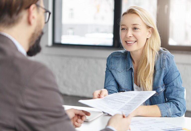 Employer evaluating intern based on professional skills