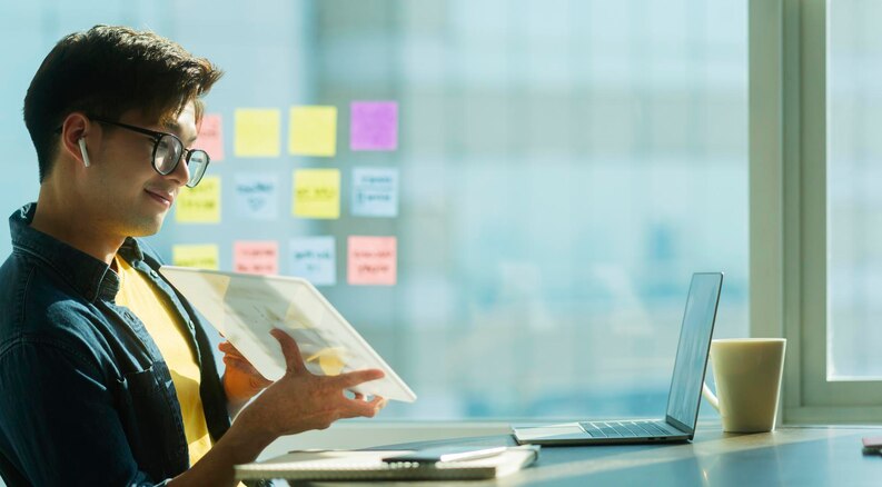 Student using project management software on a computer