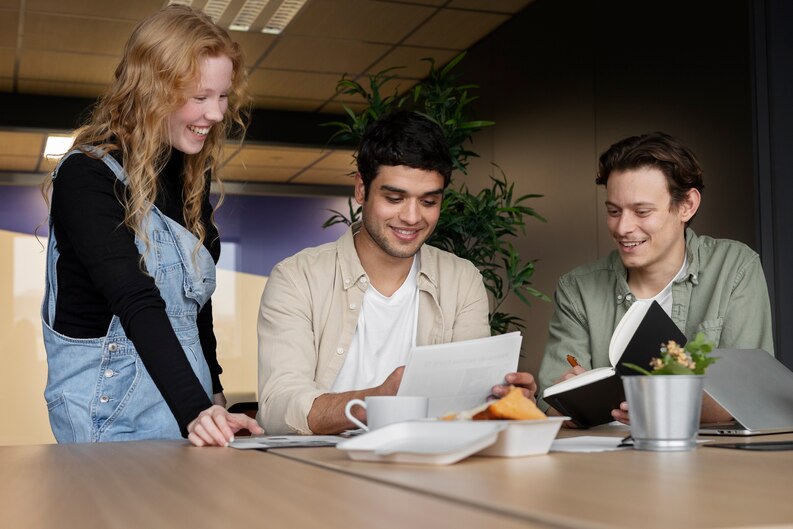 Interns collaborating on real-world business projects