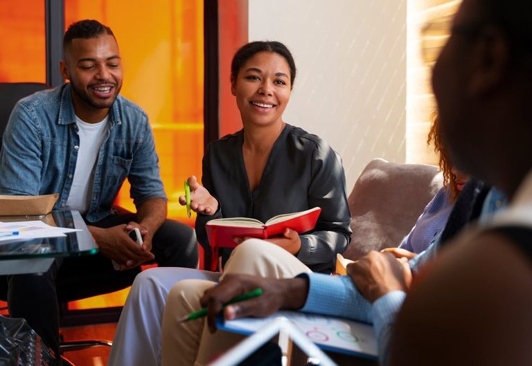 Diverse students working in a corporate office during internship