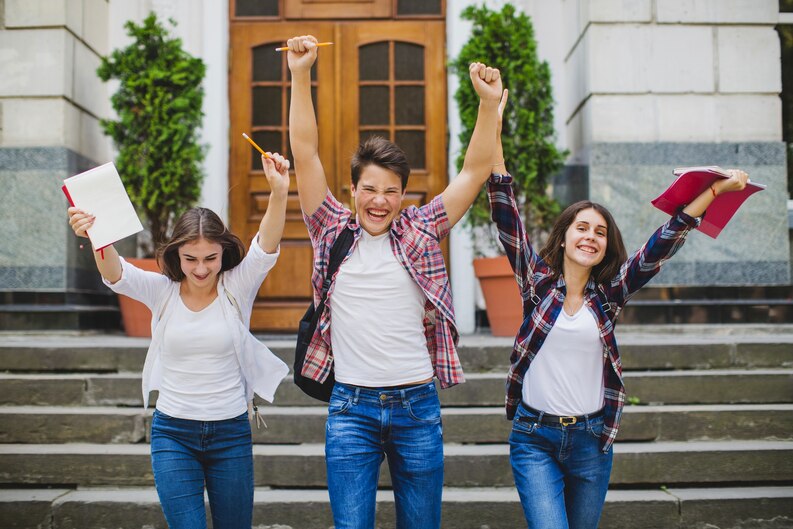 Students celebrating successful industry placements