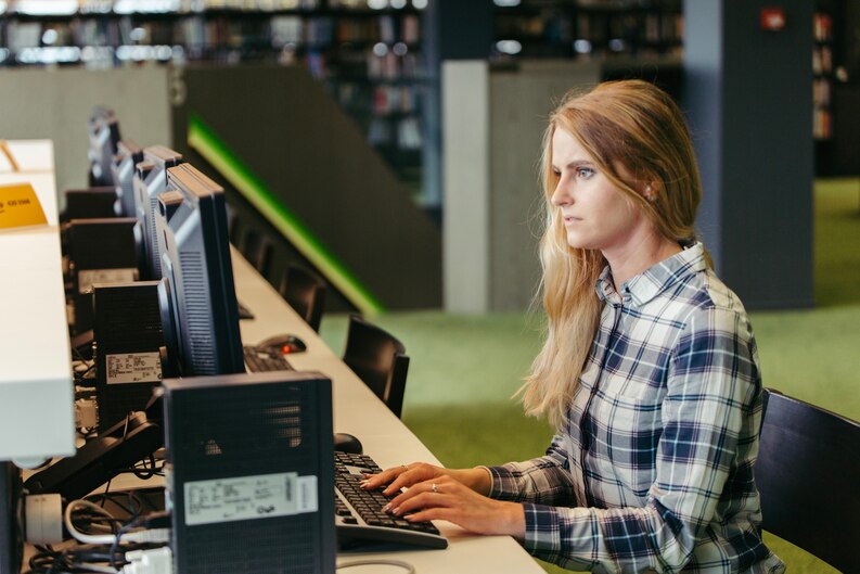 Student learning industry software during placement