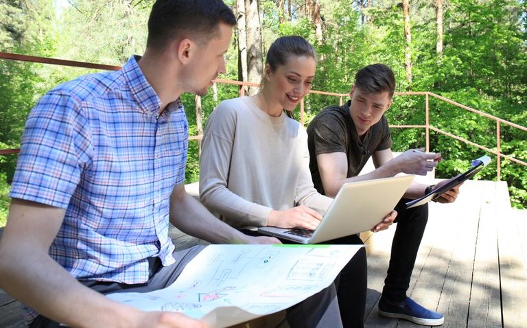 Students collaborating during internship