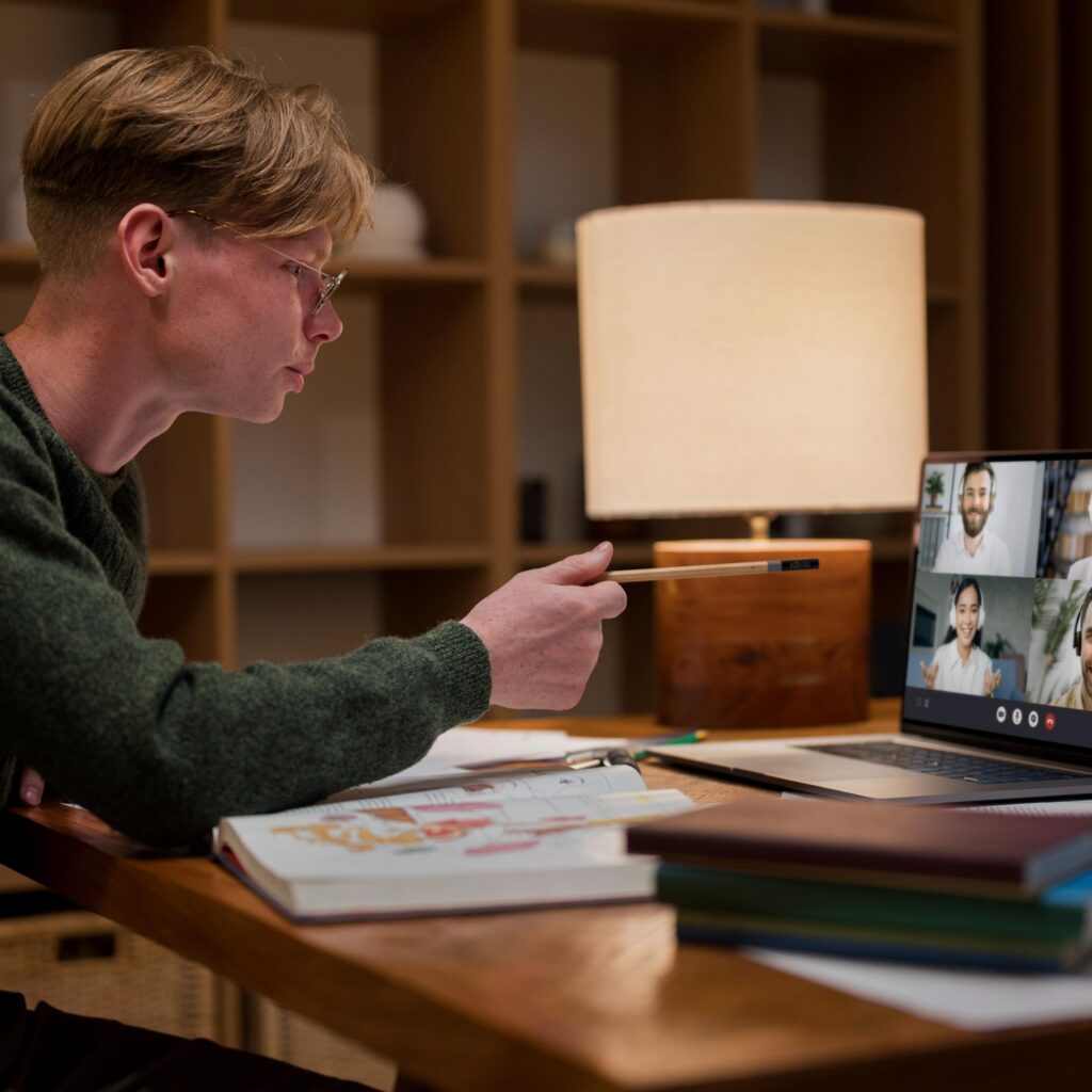 Mentor guiding remote intern via Zoom